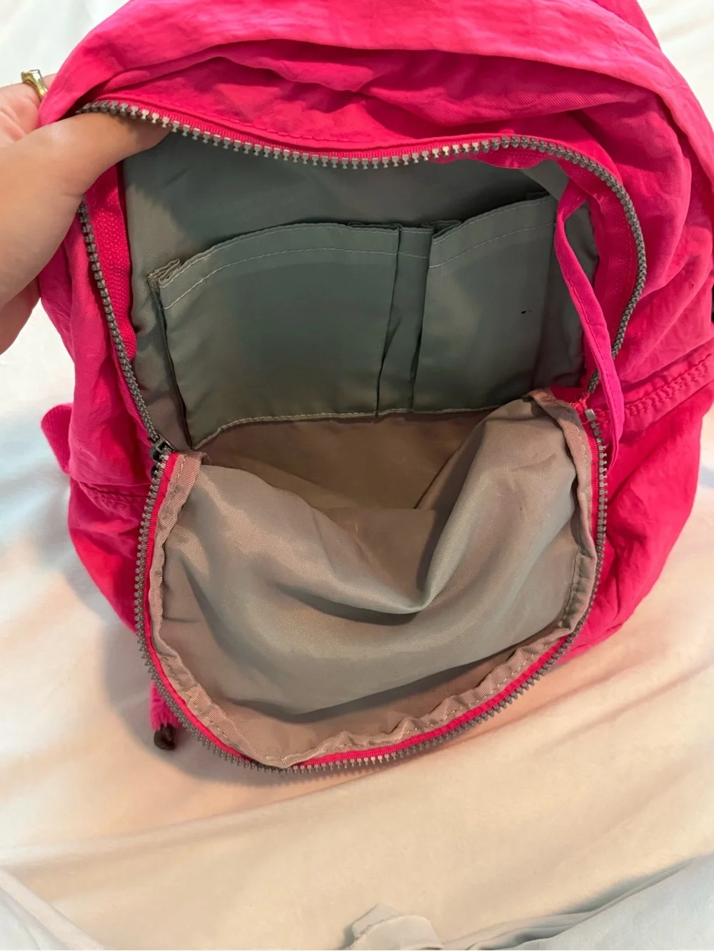 Vibrant Pink Kipling Backpack with Monkey Charm